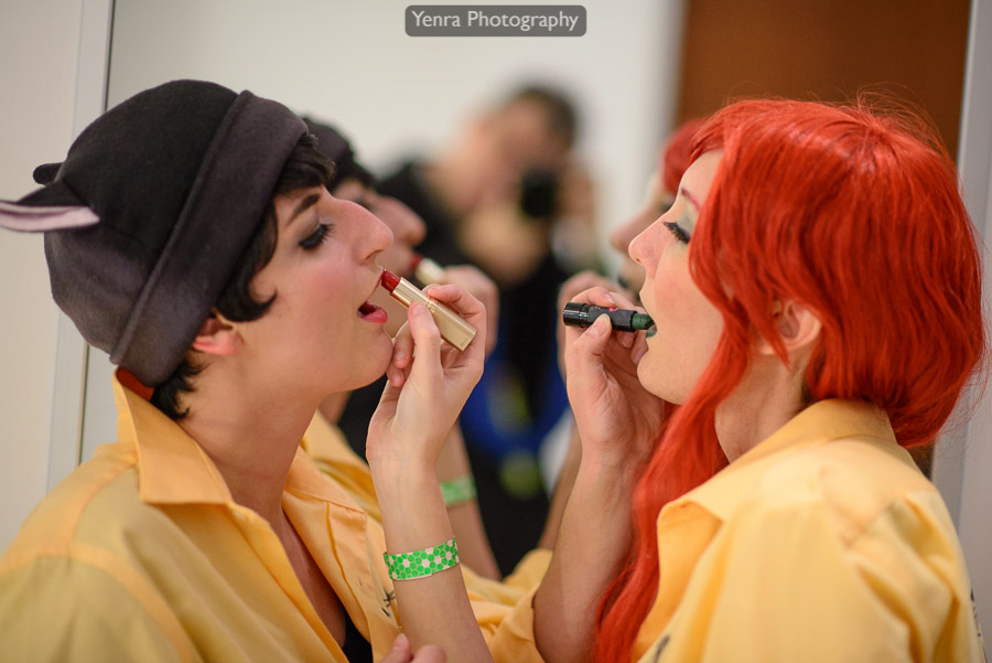 Catwoman and Poison Ivy in asylum orange tops