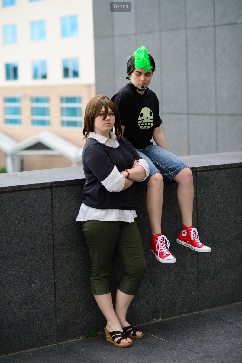Courtney standing and Duncan sitting on ledge