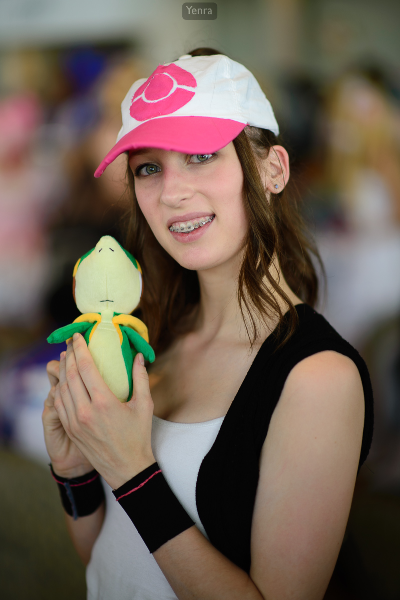 Hilda from Pokemon Black and White with Snivy