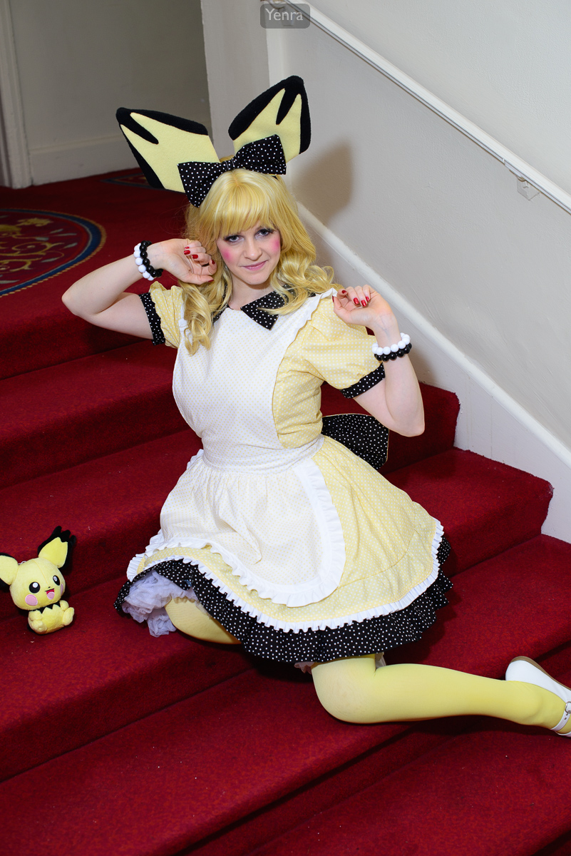 Lolita Pichu cosplay by white pillar cosplay on red stairs cosplay arms up