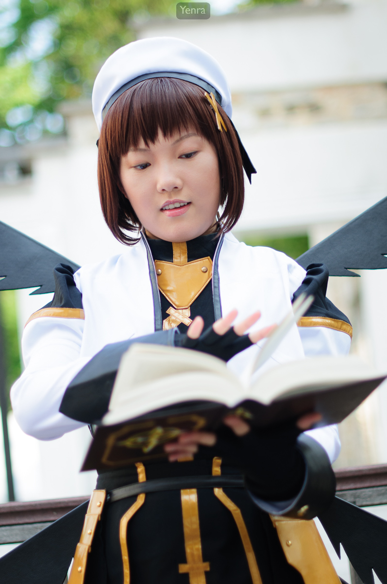 Hayate Yagami from Magical Girl Lyrical Nanoha in cosplay, holding an open book.