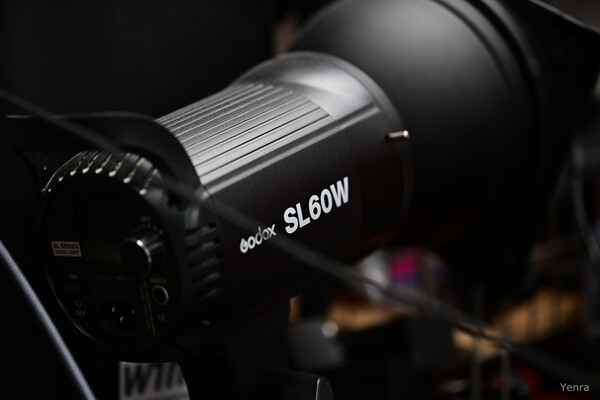 Close-up of a Godox SL60W video light showing its side profile and rear controls.