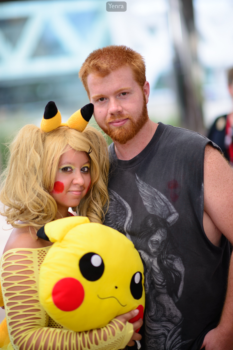 Pikachu cosplay with plushie