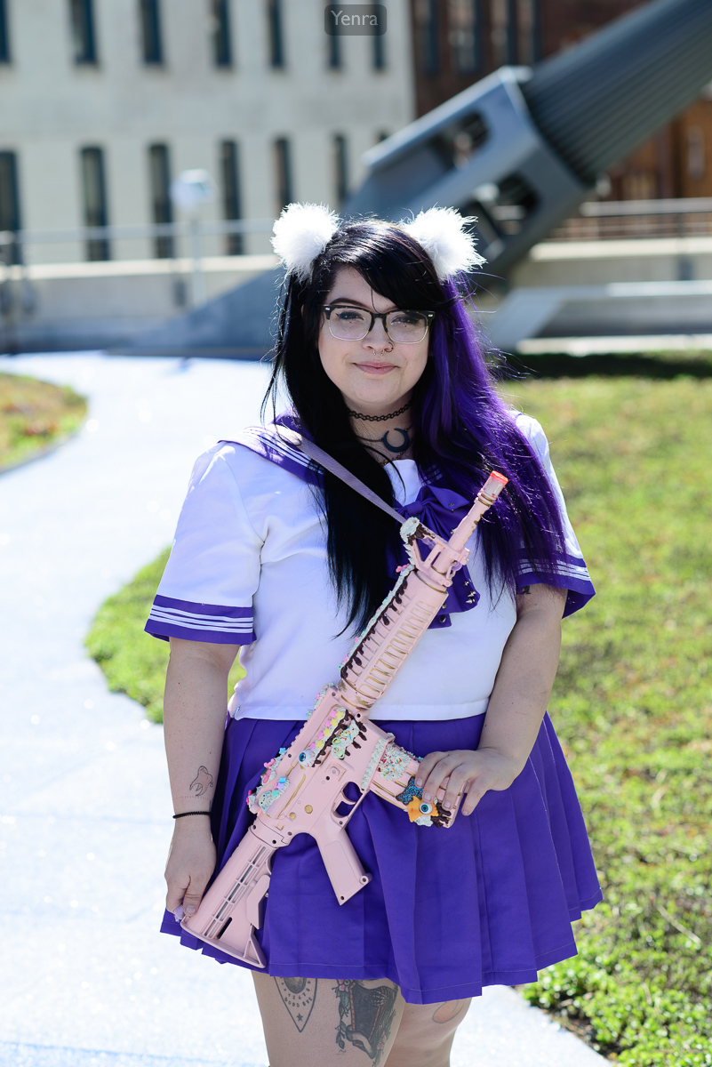 Cute Schoolgirl with Pink Gun